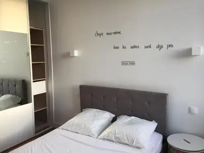Un ou plusieurs lits dans un hébergement de l'établissement Magnifique et lumineux appartement au cœur du Sancy