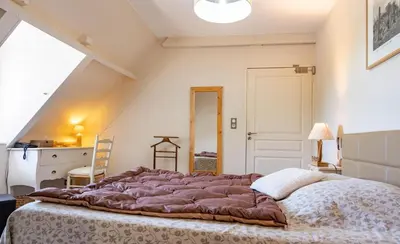 Un ou plusieurs lits dans un hébergement de l'établissement Logis hotel-restaurant les collines 59 route des crêtes