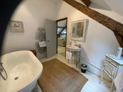 Salle de bains dans l'établissement Le Moulin des Farges