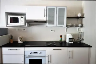 Cuisine ou kitchenette dans l'établissement Gîte Duras