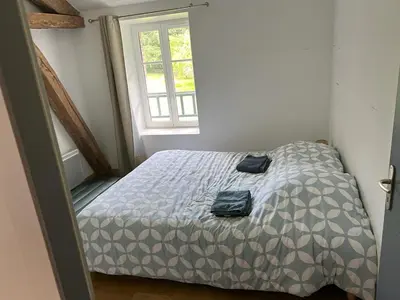Un ou plusieurs lits dans un hébergement de l'établissement Les écuries du château des Rieux