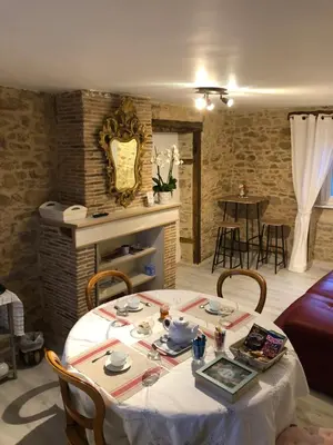 Coin salon dans l'établissement Les Tilleuls