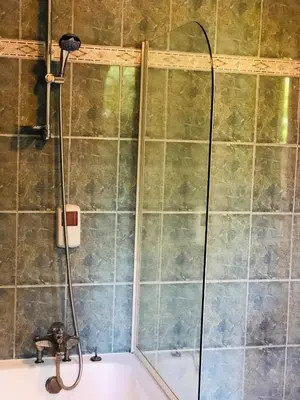 Salle de bains dans l'établissement Le Grand Hôtel