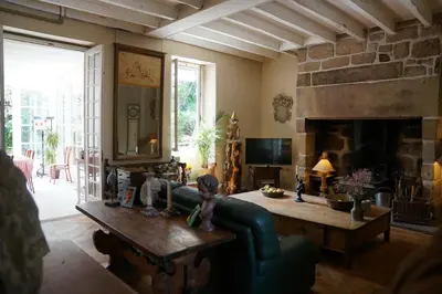 Télévision ou salle de divertissement dans l'établissement Domaine de Migoule