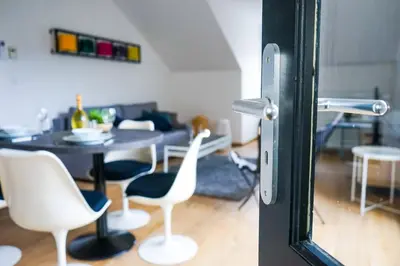 Coin salon dans l'établissement L'Eden Urbain - 2 Chambres