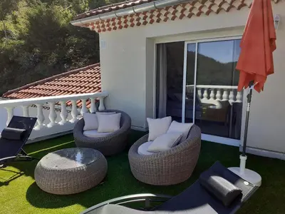 Coin salon dans l'établissement Ma villa au bord de l'eau