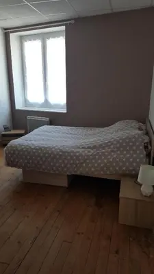 Un ou plusieurs lits dans un hébergement de l'établissement O'delices du Sancy
