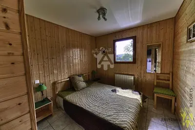 Un ou plusieurs lits dans un hébergement de l'établissement Chalet Puy Ferrand