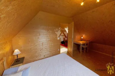 Un ou plusieurs lits dans un hébergement de l'établissement Chalet Puy Ferrand