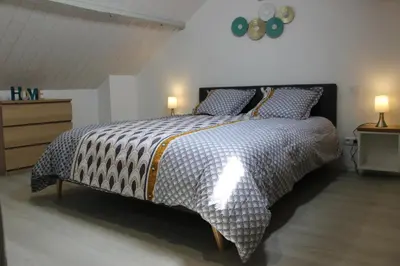 Un ou plusieurs lits dans un hébergement de l'établissement Bel appartement avec vue sur vézère