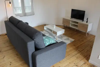 Télévision ou salle de divertissement dans l'établissement Bel appartement avec vue sur vézère