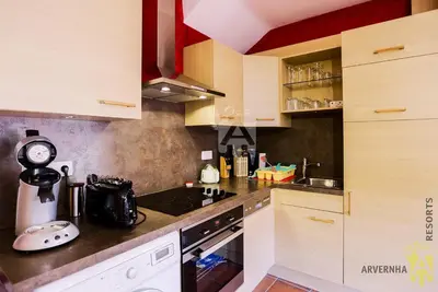 Cuisine ou kitchenette dans l'établissement Heurtebise Bas