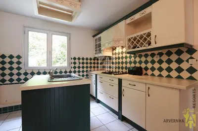 Cuisine ou kitchenette dans l'établissement Rev'O'Lac 2