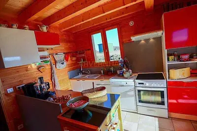 Cuisine ou kitchenette dans l'établissement Grandeur Nature