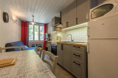 Cuisine ou kitchenette dans l'établissement Le Petit Lutess