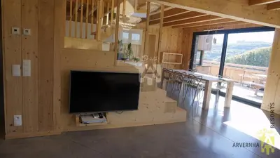 Télévision ou salle de divertissement dans l'établissement La Cabane de Marcha