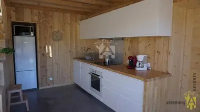 Cuisine ou kitchenette dans l'établissement La Cabane de Marcha