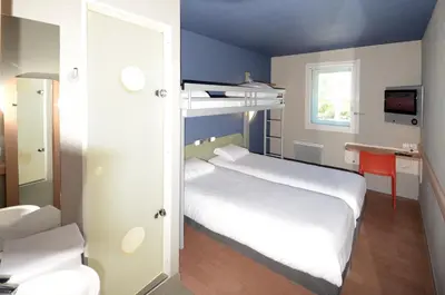 Un ou plusieurs lits dans un hébergement de l'établissement ibis budget Brive La Gaillarde