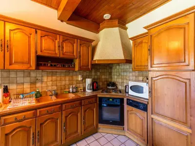 Cuisine ou kitchenette dans l'établissement Vic-sur-Cère Family Nest