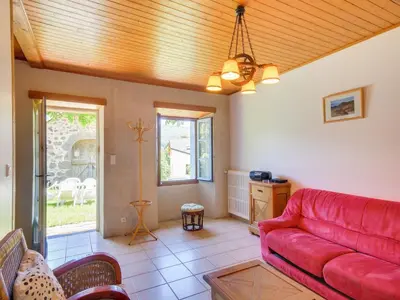 Coin salon dans l'établissement Vic-sur-Cère Family Nest