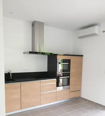 Cuisine ou kitchenette dans l'établissement Gîtes de Maurs