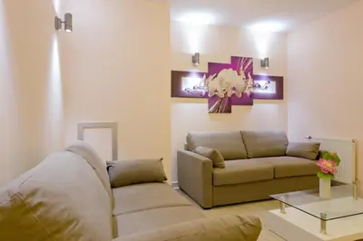 Coin salon dans l'établissement Hôtel du Parc