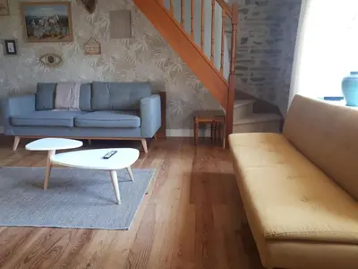 Coin salon dans l'établissement Domaine des grandes landes