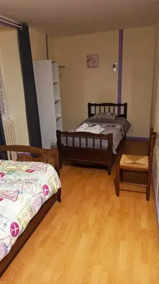 Un ou plusieurs lits dans un hébergement de l'établissement La Ferme de Laupilière