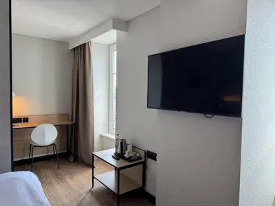 Télévision ou salle de divertissement dans l'établissement ibis Limoges Centre