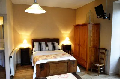 Un ou plusieurs lits dans un hébergement de l'établissement Les gîtes du bourg