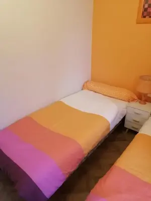 Un ou plusieurs lits dans un hébergement de l'établissement Lanteuil Maison de vacances à côté de brive et collonge la rouge