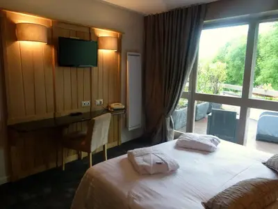 Un ou plusieurs lits dans un hébergement de l'établissement Bastide du Cantal