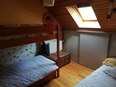 Un ou plusieurs lits dans un hébergement de l'établissement Maison typique pleine de charme Peyrusse Cantal