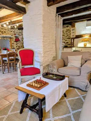 Coin salon dans l'établissement Gîte le pré des Colombes