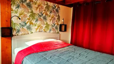 Un ou plusieurs lits dans un hébergement de l'établissement Gite 3étoiles Coconning dans une grange cantalienne - Cantal Emotions Valette Auvergne