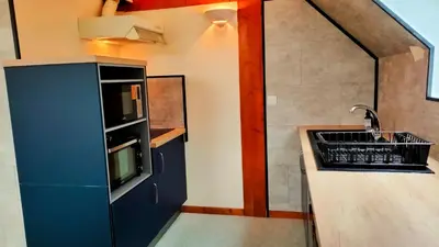Cuisine ou kitchenette dans l'établissement Gite 3étoiles Coconning dans une grange cantalienne - Cantal Emotions Valette Auvergne