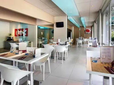 Restaurant ou autre lieu de restauration dans l'établissement Mercure Brive