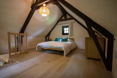 Un ou plusieurs lits dans un hébergement de l'établissement Petit Maison du Chêne