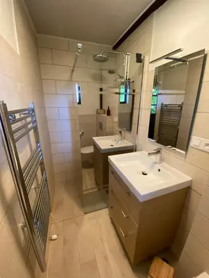 Salle de bains dans l'établissement Petit Maison du Chêne