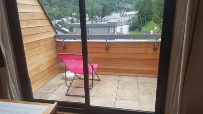 Balcon ou terrasse dans l'établissement appartement chaleureux avec terrasse ensoleillée 2 étoiles