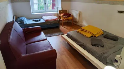 Coin salon dans l'établissement Grande maison dans la cité médiévale de Besse