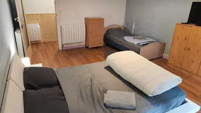 Un ou plusieurs lits dans un hébergement de l'établissement Grande maison dans la cité médiévale de Besse