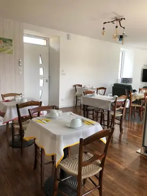Télévision ou salle de divertissement dans l'établissement Le Moulin de Lassalle