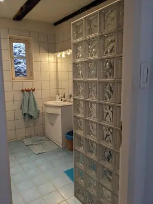 Salle de bains dans l'établissement Le Petit Chat