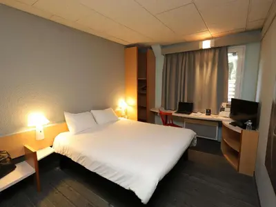 Un ou plusieurs lits dans un hébergement de l'établissement ibis Egletons