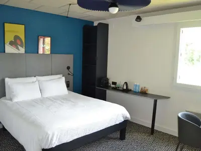 Un ou plusieurs lits dans un hébergement de l'établissement ibis Egletons