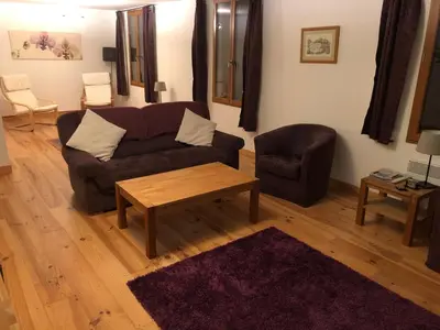 Coin salon dans l'établissement Gites La Chabanaise