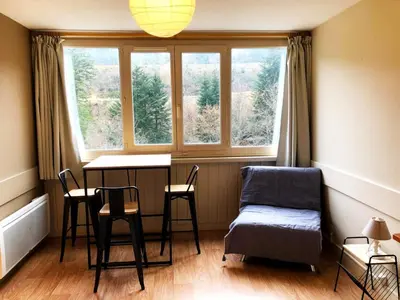 Coin salon dans l'établissement La Randonnée Résidence Le Bec de L'Aigle