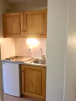 Cuisine ou kitchenette dans l'établissement La Randonnée Résidence Le Bec de L'Aigle
