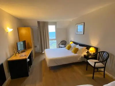 Un ou plusieurs lits dans un hébergement de l'établissement Le Relais de Castelnau
